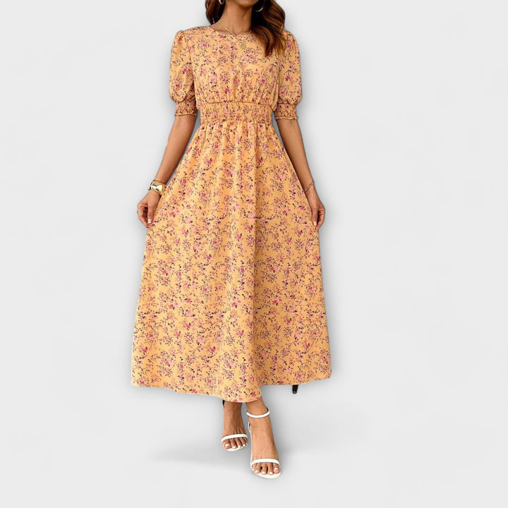 Amélia – rundhalsad klänning med blommönster