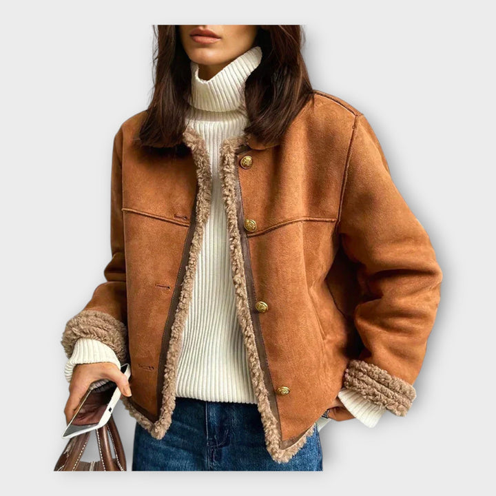 Elegant skinnjacka med varmt foder och klassisk stil