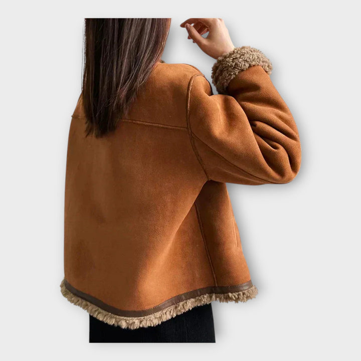 Elegant skinnjacka med varmt foder och klassisk stil