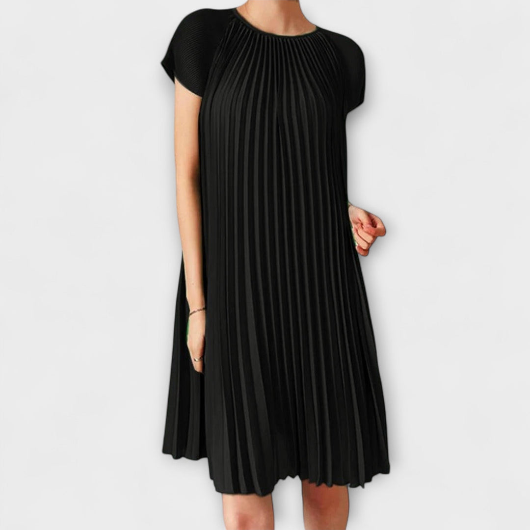 Elegant plisserad klänning