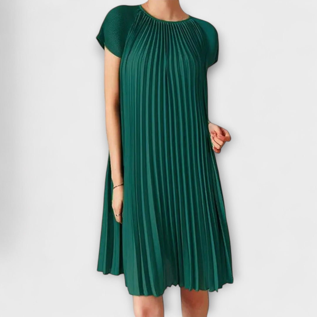 Elegant plisserad klänning