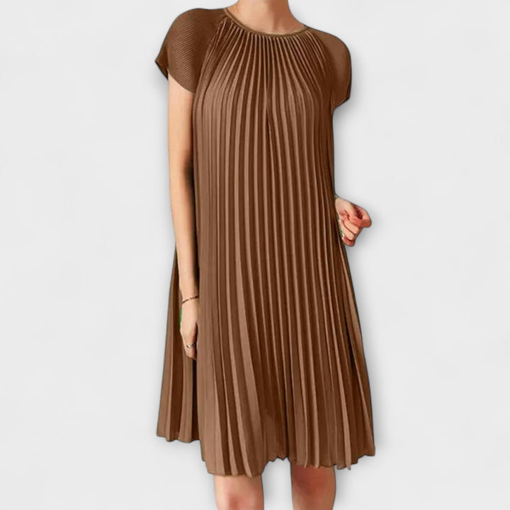 Elegant plisserad klänning